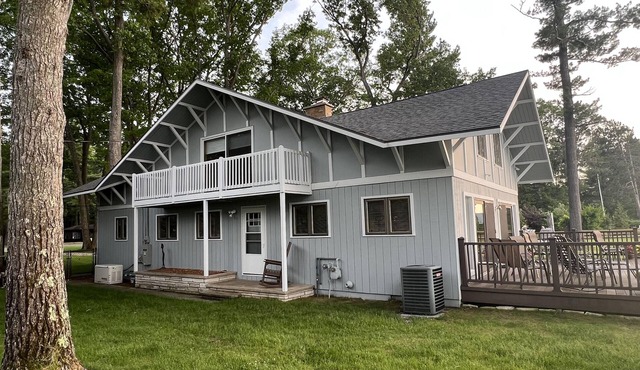 Torch Lake home, south end of lake, sandy beach, mile-and-a-half from sand bar!