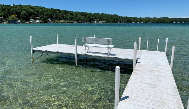 Torch Lake Oasis: Serene Views & Waterfront Bliss Await!
