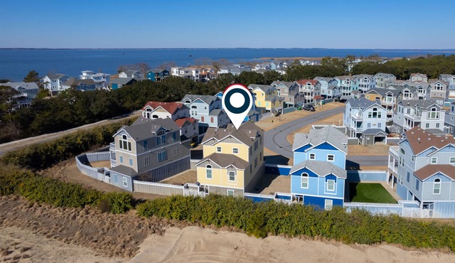 Towering beach house with a private hot tub, pool, WiFi, & washer/dryer