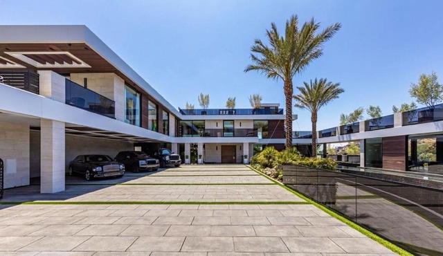 Towering gracefully above dazzling city lights