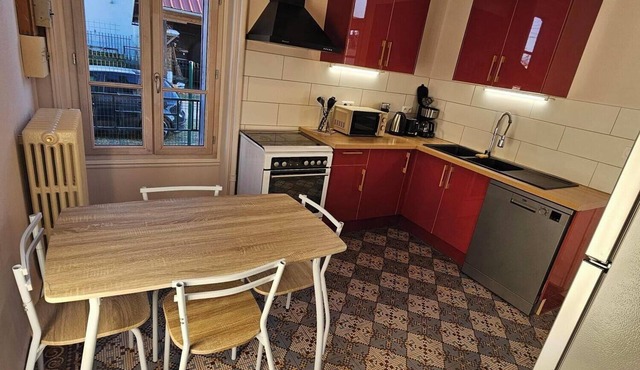 Town house with courtyard and garden close to shops.