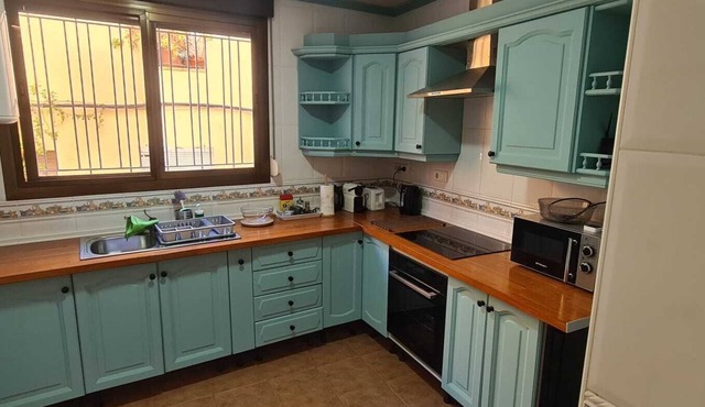 Town House with roof terrace and stunning views. Close to all local amenities