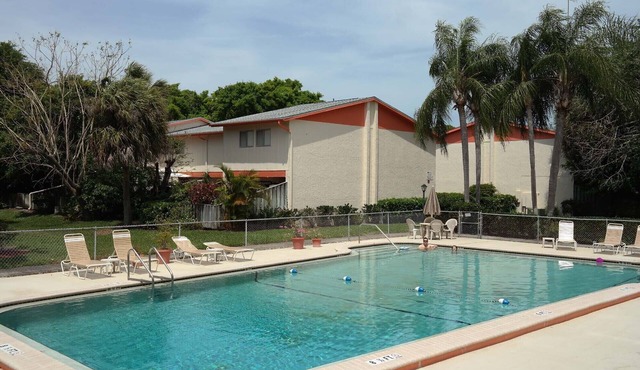 Townhouse-Style Condo in Quiet Complex with Palm Trees and Pool