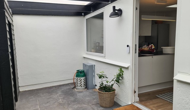 Townhouse with wooden terrace