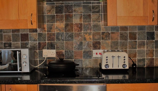 Traditional 17th century Lakeland stone barn between lakes Haweswater and Ullswater