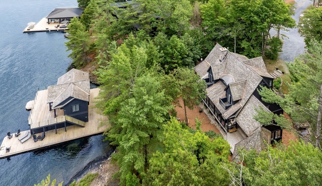 Traditional 6 bed 5 bath cottage on Lake Joseph with matching Boathouse