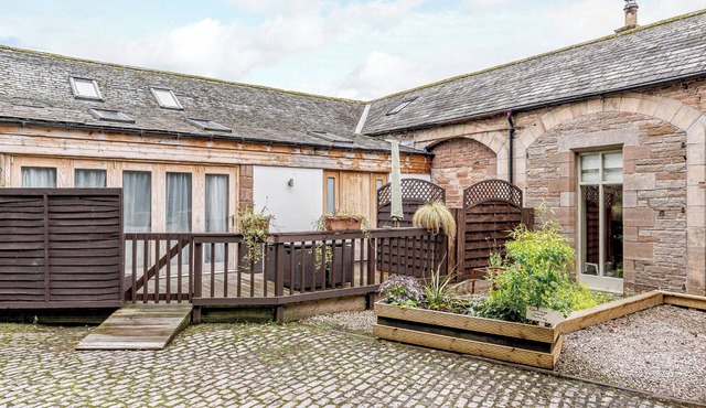 Traditional and stylish converted two storey historic coach house.