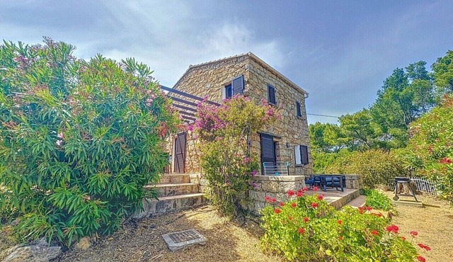 Traditional Corsican house between sea and scrub