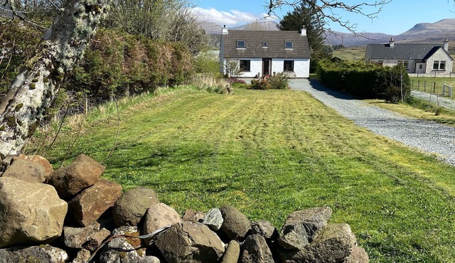 Traditional Croft House with garden. Ample parking and central location.