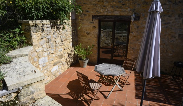 Traditional stone cottage in rural setting with direct access to poolside