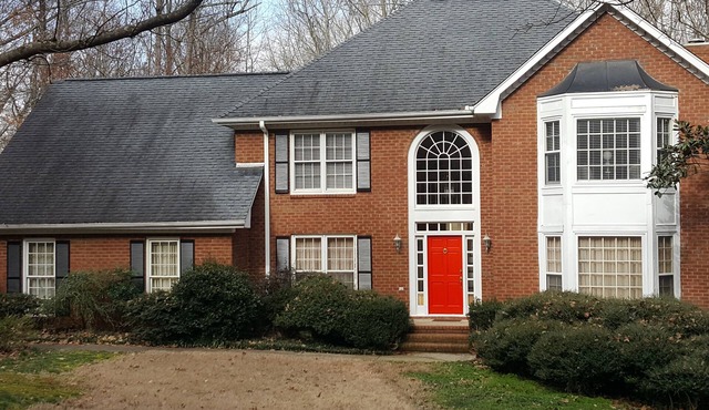 Traditional Home on 2.4 Wooded Acres in swim community.