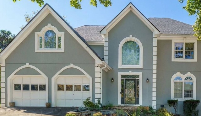 Traditional Home with Long Level Driveway offers media room and 4/2.5