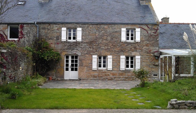 Traditional house made of granit, next to the harbour