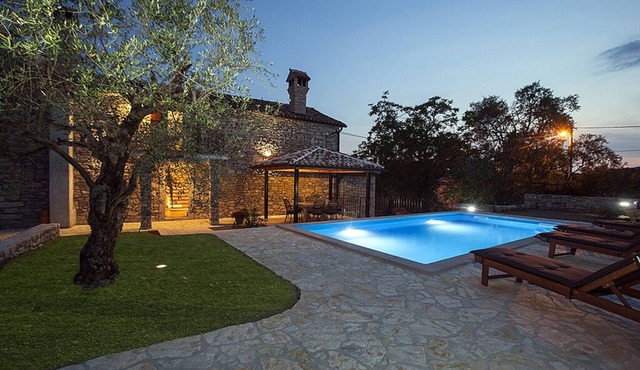 Traditional Istrian stone house with large pool