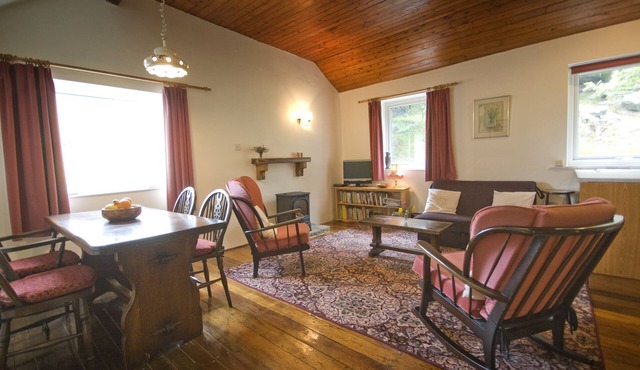 Traditional stone cottage in Barkisland. Superb views. Pet friendly. Four Stars.