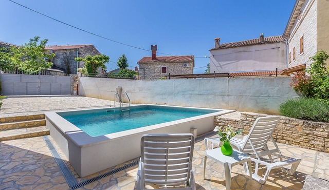 Traditional villa with private pool, sun beds
