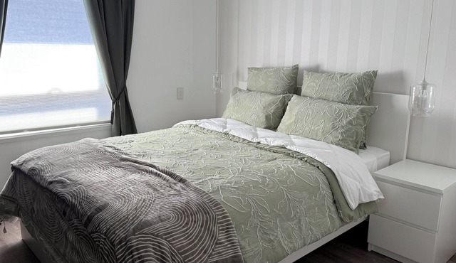 Tranquil 2 bedroom home featur an open-plan living area and outdoor courtyard.