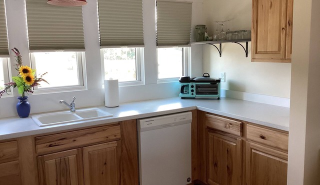 Tranquil and private a newn waterfront property located directly on Orange Lake