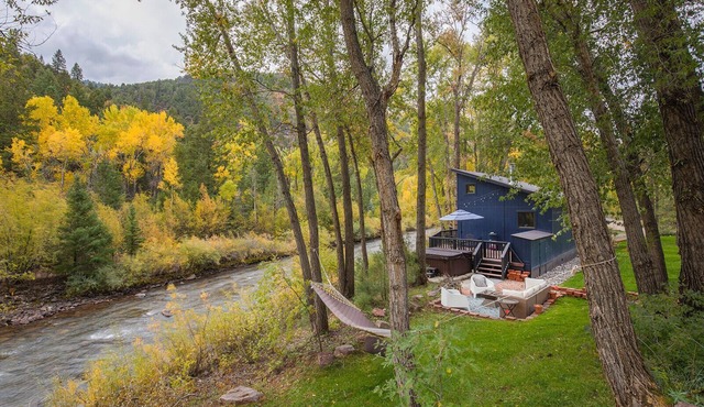 Tranquil cabin right on the San Miguel River, just 20 minutes from Telluride.