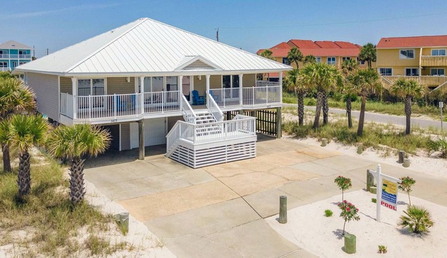 Tranquil covered deck with Gulf views, private pool and easy beach access.