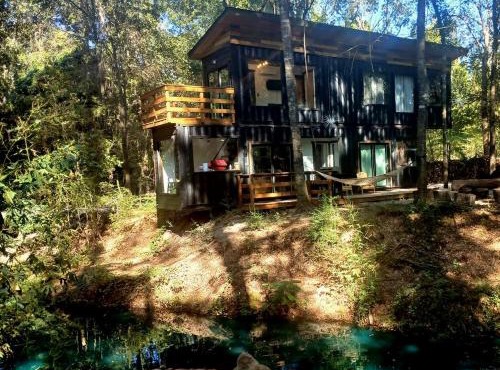 Tranquil Creekside Container with Private Waterfall Near Renaissance Festival | Magnolia, Texas