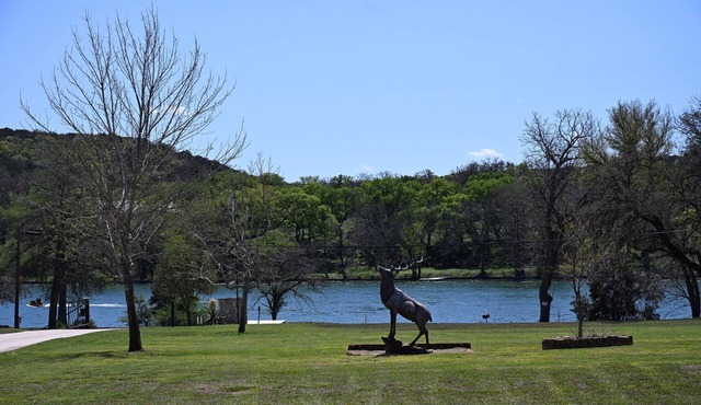 Tranquil Lakefront Retreat: 1BR Cabin with Covered Patio & Private Dock