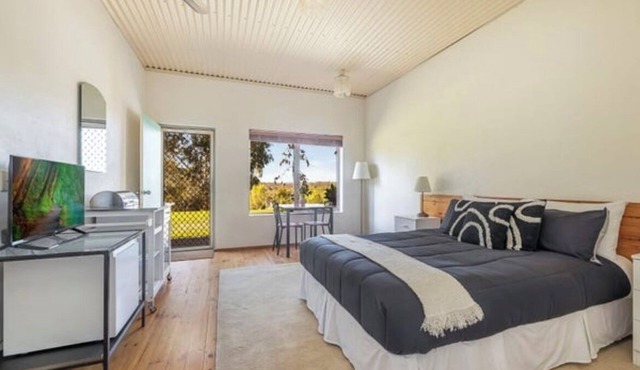 Tranquil motel style large room.