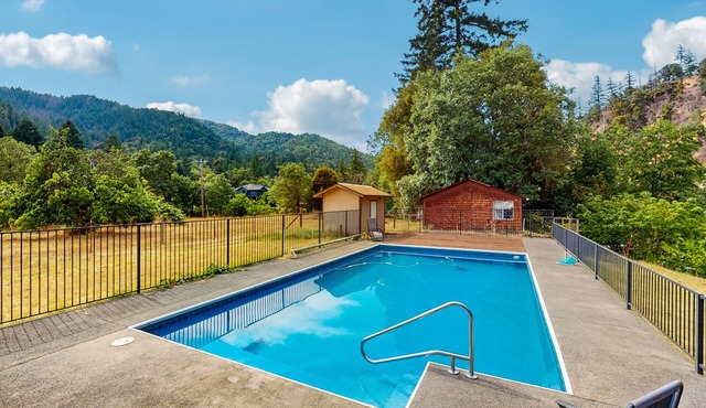 Tranquil riverfront getaway, private pool, seasonal fruit trees, & fishing