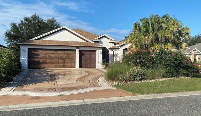 Tranquil SPA Retreat 3-bedroom house w golf cart in The Villages