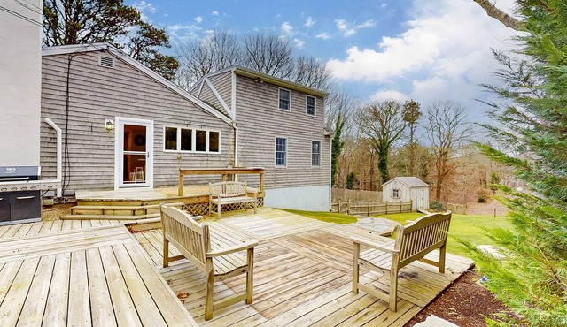 Tranquil & sunlit home with peaceful yard, large deck, & fireplace - near beach
