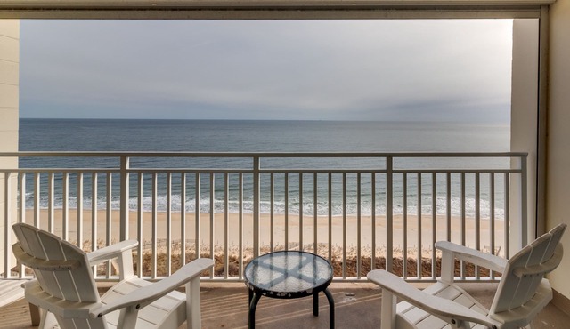 Tranquil waterfront condo with pools, gym, arcade & ice rink