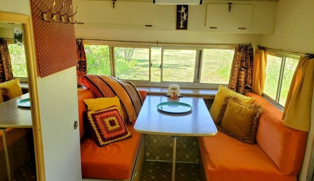 Travel back in time and camp like its 1970! Camper outfitted with 1970s gear.