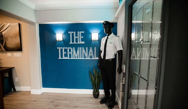 *Travel Themed Property with Backyard Oasis*