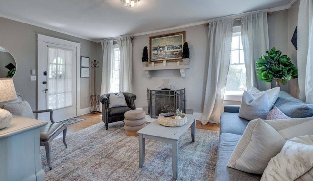 Treat yourself to this 4BR/2BA 1930s brick Tudor that exudes pure Southern charm