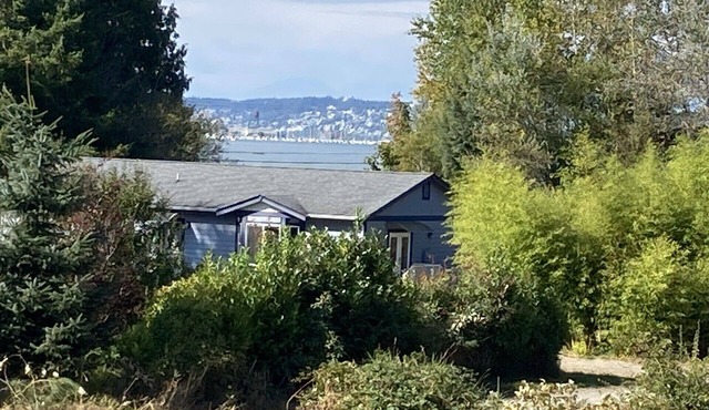 Treat yourself to water, mountain and sunset views, even while doing the dishes.