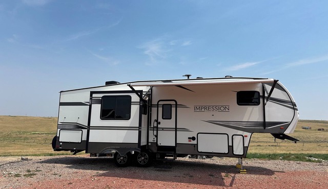 Tremendous camper with A/C and full hookups. Close to the Camplex.