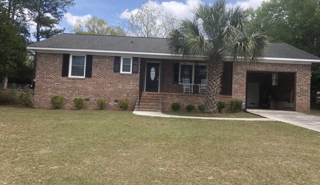 Trendy, cozy and casual 2 bedroom brick with garage