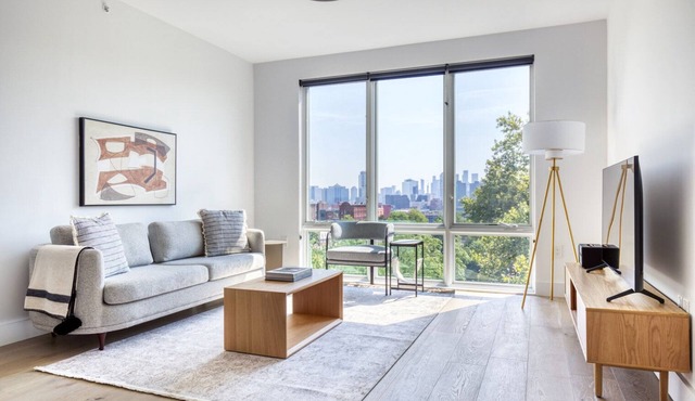 Trendy Jersey City 2BR w/W/D, Roof & Gym, nr Path, by Blueground