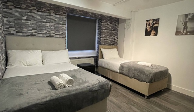 Triple Room - Shared Bathroom