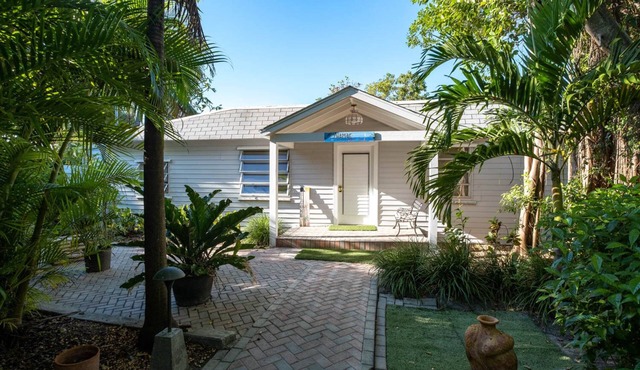 Tropical bayfront villa with sandy beach