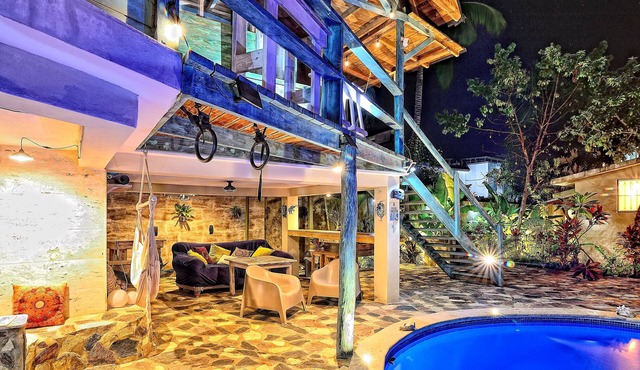Tropical guesthouse by the pool in the lush garden and best area close to beach.