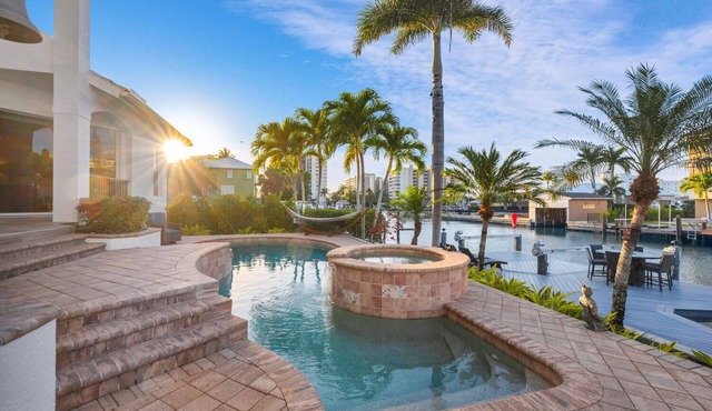 Tropical Oasis! - Luxury Canal Home! 1 Mile To The Beach! Heated Pool & Spa