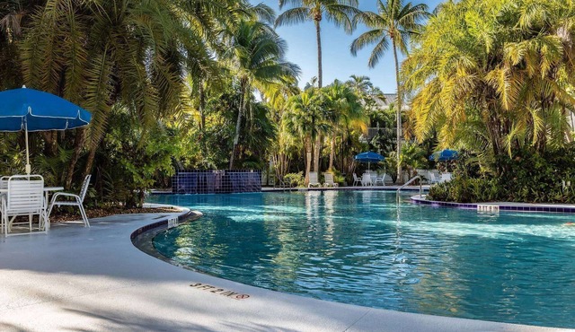Tropical Tee-Time: 2BR Townhome in Key West Golf Club with Two Shared Pools, Fitness Center, Dogs OK