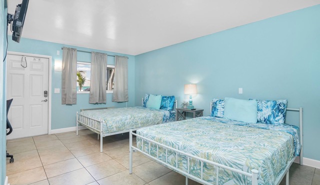 Tropical Two Queen Bed Room at Fort Myers Beach