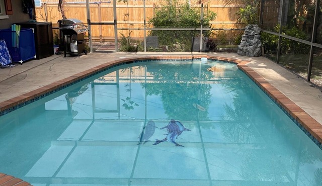 Tropical vacation house with large, heated pool and spacious, open floor plan