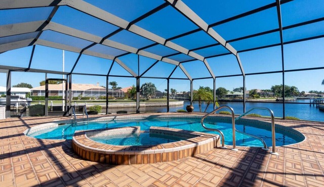 Tropical Waterfront Villa with Heated Pool & Spa