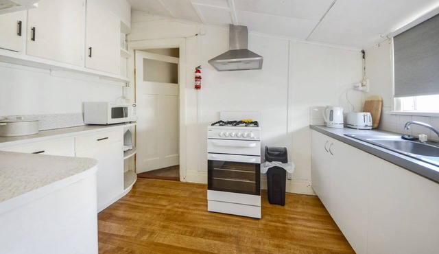 Tucked in behind the local Baker, centrally located.