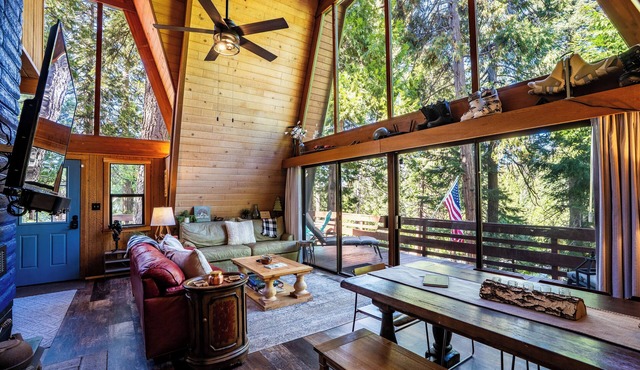 Tucked in the trees, Cedar Hill is a cozy A-frame cabin with modern updates, a spacious kitchen, wraparound deck, and stunning views. The perfect mountain escape for families, couples, and friends—plus, it's pet-friendly!