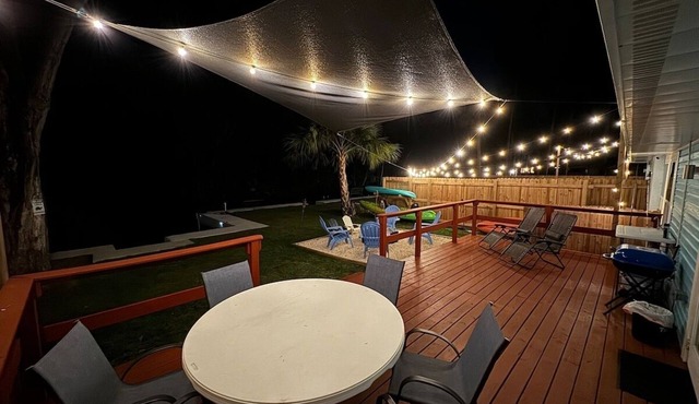 Turtle House-pet friendly, waterfront home with boat slip, kayaks, fire pit