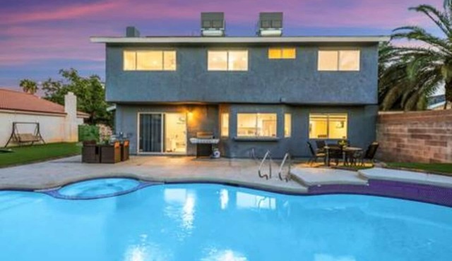 TWAIN AVE · Modern Oasis: Heated Pool & Game Room